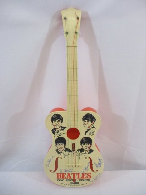 The Beatles Signed Selcol Toy Guitar – Signed by John, Paul, George and Ringo (1 of 4)