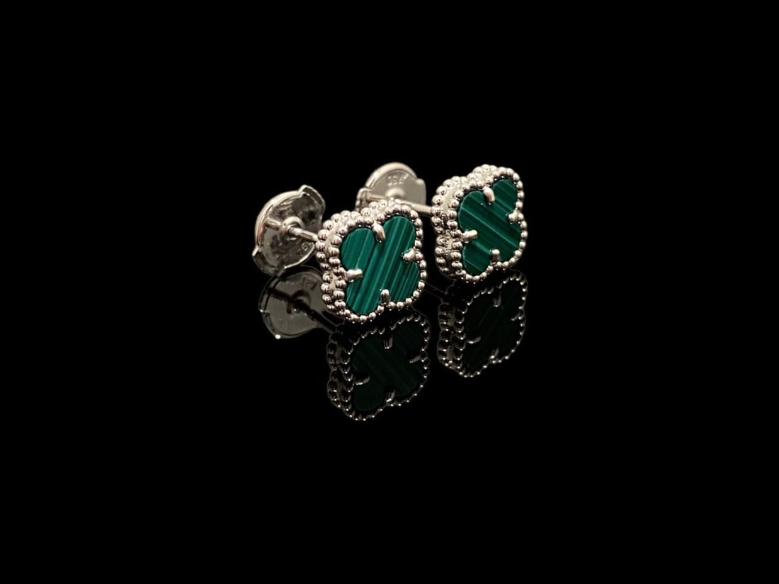 Van Cleef & Arpels, 18K White Gold, Malachite, Sweet Alhambra Earstuds: Van Cleef & Arpels, 18K White Gold, Malachite, Sweet Alhambra EarstudsBrand: Van Cleef & Arpels Condition: pre-ownedMetal: 18K White GoldGem stone: MalachiteComes with original pouch or box