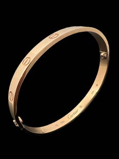 Cartier 18K Yellow Gold Love Bangle Bracelet: Cartier 18K Yellow Gold Love Bangle Bracelet 100% Authentic Retail Price: $7,350Condition: Like new.Brand: Cartier.Metal: 18k yellow gold.Bracelet size: 19.Weight: 32.3 Grams Comes with Original Box