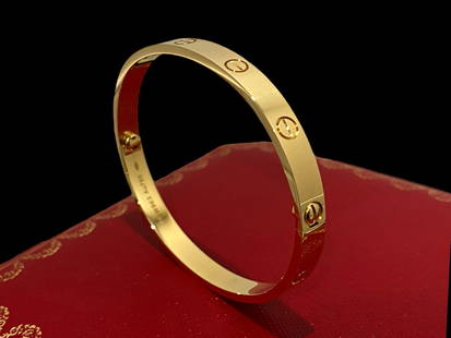 Cartier 18K Yellow Gold Love Bracelet Size 19: Cartier 18K Yellow Gold Love Bracelet Size 19 Comes with Certificate of AuthenticityCondition: GoodBrand: CartierMetal: 18K Yellow Gold Size: 19Retail price: $6,900Comes with original box or pouch.