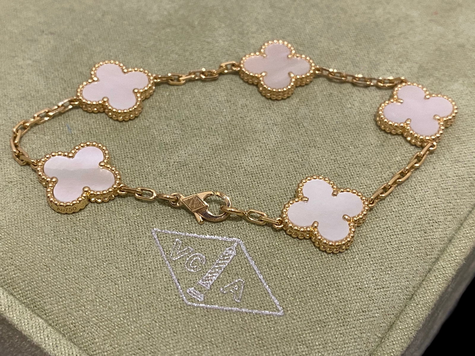 Van Cleef & Arpels Vintage Alhambra Bracelet 5 Motifs 18K Yellow Gold Mother-of-Pearl: Condition: Like new Brand: Van Cleef & Arpels Metal: 18k yellow gold Gem stone: Mother-of-pearl Comes with original box or pouch.