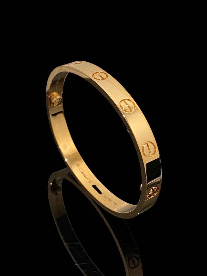 CARTIER LOVE BRACELET 18K ROSE GOLD SIZE 16: CARTIER LOVE BRACELET 18K ROSE GOLD SIZE 16Condition: Like new.Brand: Cartier.Metal: 18k rose gold.Bracelet size: 16.Comes with original box or pouch.