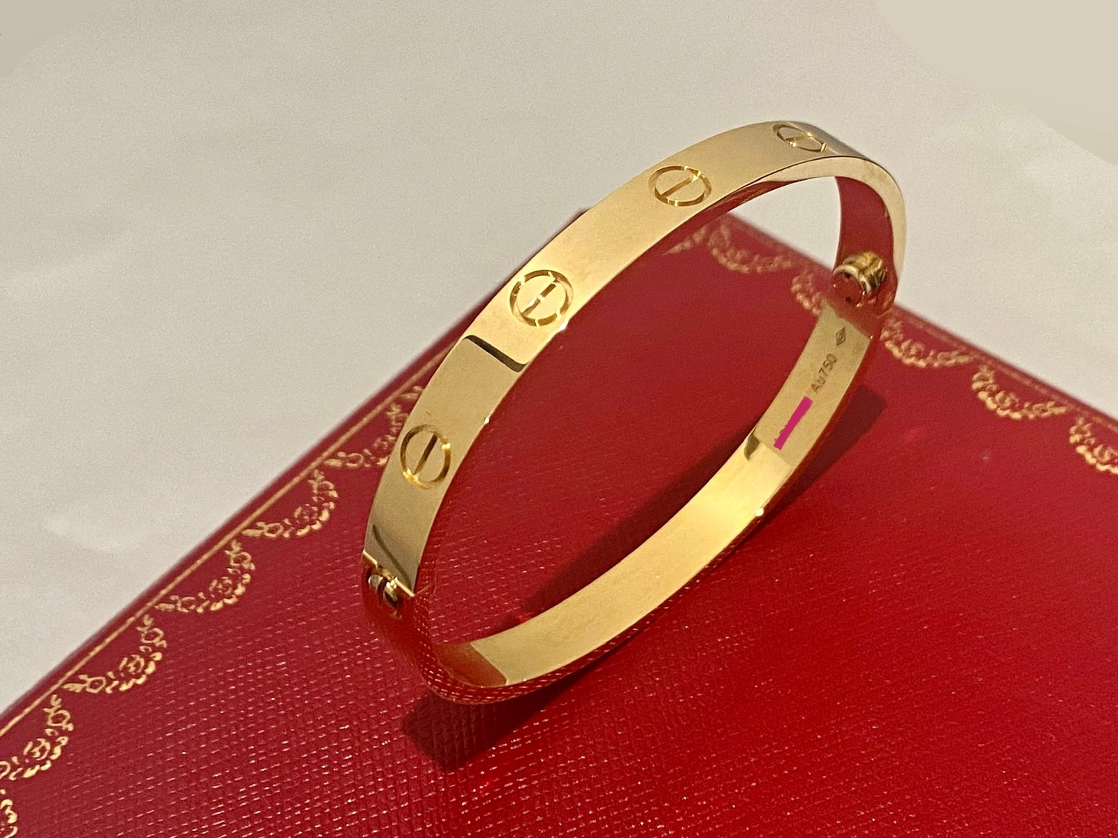 Cartier 18K Yellow Gold Love Bracelet Size 17: Condition: Pre-owned Brand: Cartier Material: 18K Yellow Gold Width: 6.1 mm Retail Price: $7,350