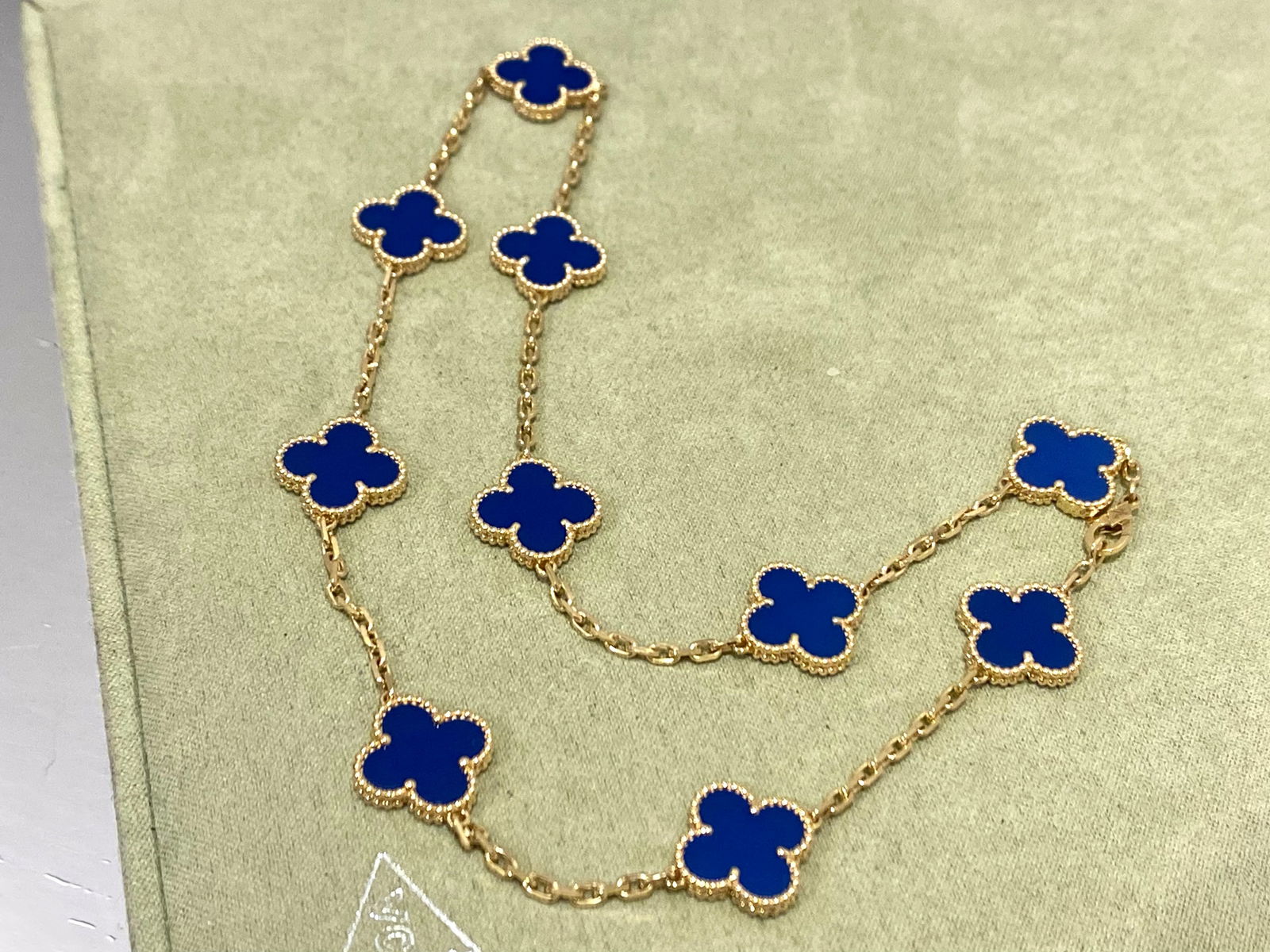 Van Cleef & Arpels Vintage Alhambra necklace, 10 motifs. 18k yellow gold, Blue Agate (1 of 6)