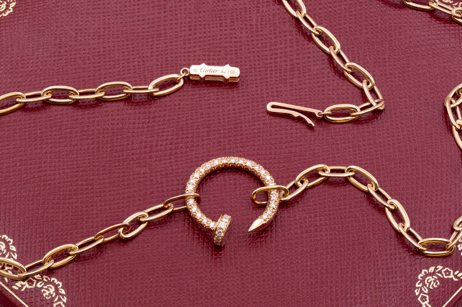 Cartier Juste un Clou necklace 18K rose gold: Cartier Juste un Clou necklace 18K rose gold(750/1000), set with 37 brilliant-cut diamonds totaling 0.40 carats. Width: 2.2mm. Inner diameter 14.2mm. Chain length: 45cm.Retail:$12,900