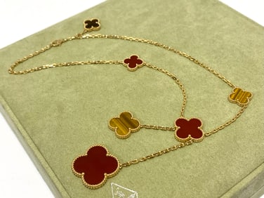 Van Cleef and Arpels Magic Alhambra necklace, 6 motifs, 18k yellow gold, carnelian ,tiger eye.