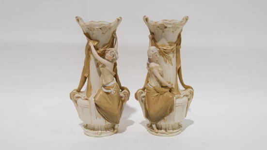 A Bohemian pair Royal Dux glazed ceramic figural vases: A Bohemian pair Royal Dux glazed ceramic figural vases, model nr. 1469, early 20th Century. Condition: one vase has a minor chip on the rim at the bottom, otherwise in excellent condition. Height: 4