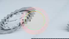 An Art Deco Cartier Table clock with guilloché enamel dial - old cut diamond hands and Rose Quartz.