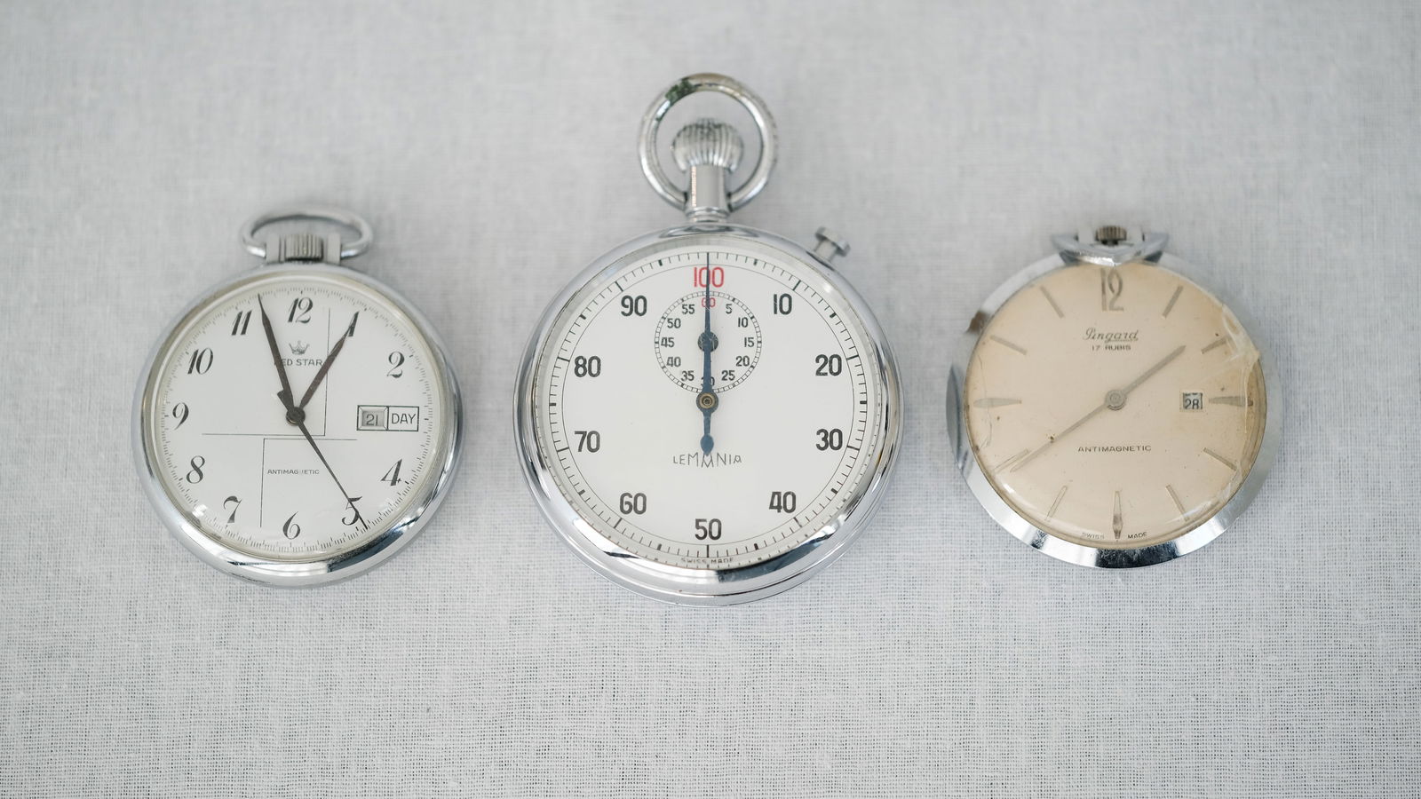 A composed lot of three Pocketwatches by Pingard Swiss made, Redstar, Lemania Cronometre (1 of 5)