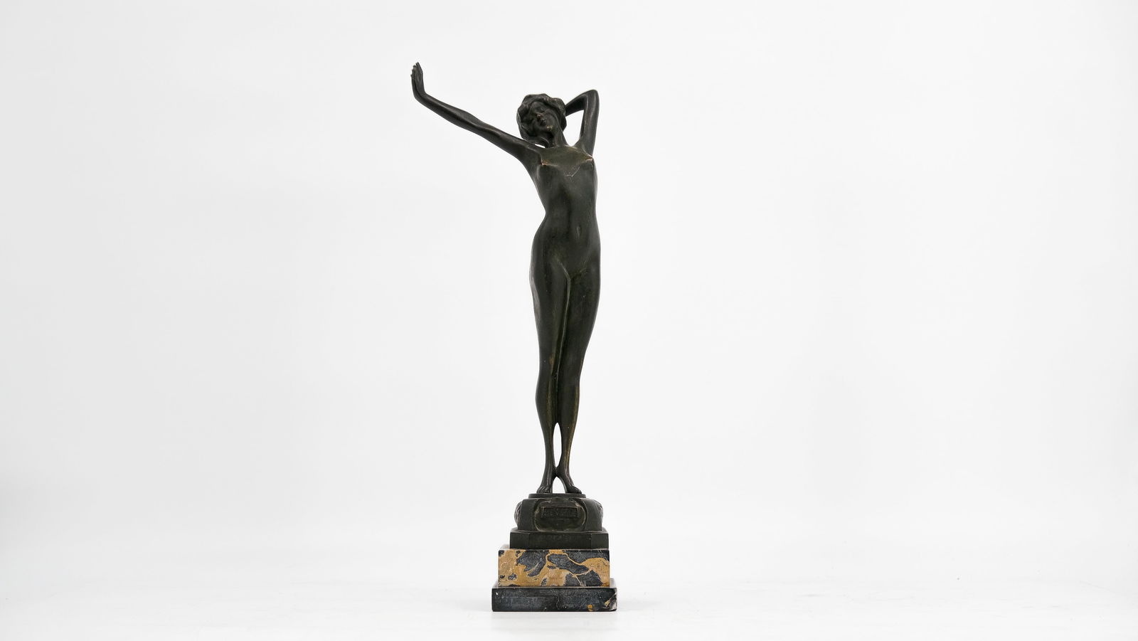 An Art deco style brass figure after Paul Philippe (1870-1930) - Le Reveil: An Art deco style brass figure attributed to and modelled after Paul Philippe (1870-1930) "Le Reveil", on a portor marble base. Circa 1930's. Height: 40 cm (excl. base)