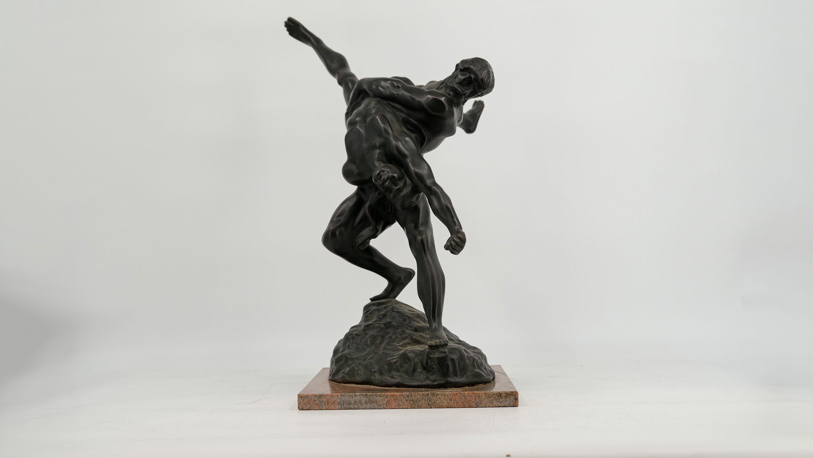 A Belgian Patinated figural Bronze group by Jef Lambeaux (1852-1908)"The Wrestlers".: A Belgian Patinated figural Bronze group by Jef Lambeaux (1852-1908) "The Wrestlers". Foundry mark R. Debraz Brussels. Signed "Jef Lambeaux -Van Antwerpen". On a modern granite base. 1
