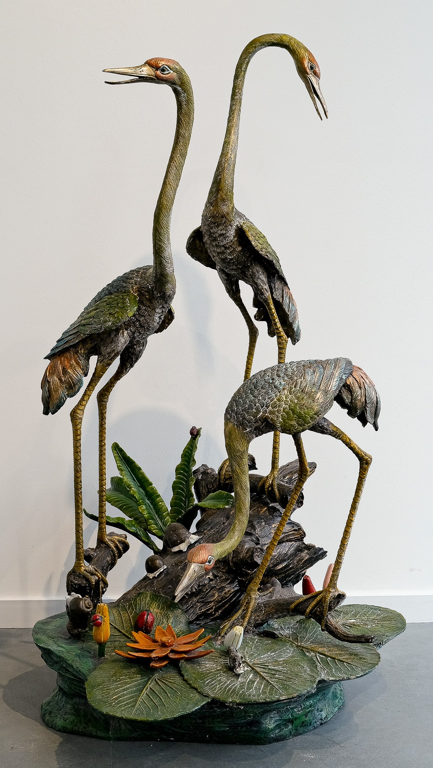 An imposing and variously patinated bronze sculpture group, of a "Herons scene" 20th Century. (1 of 8)