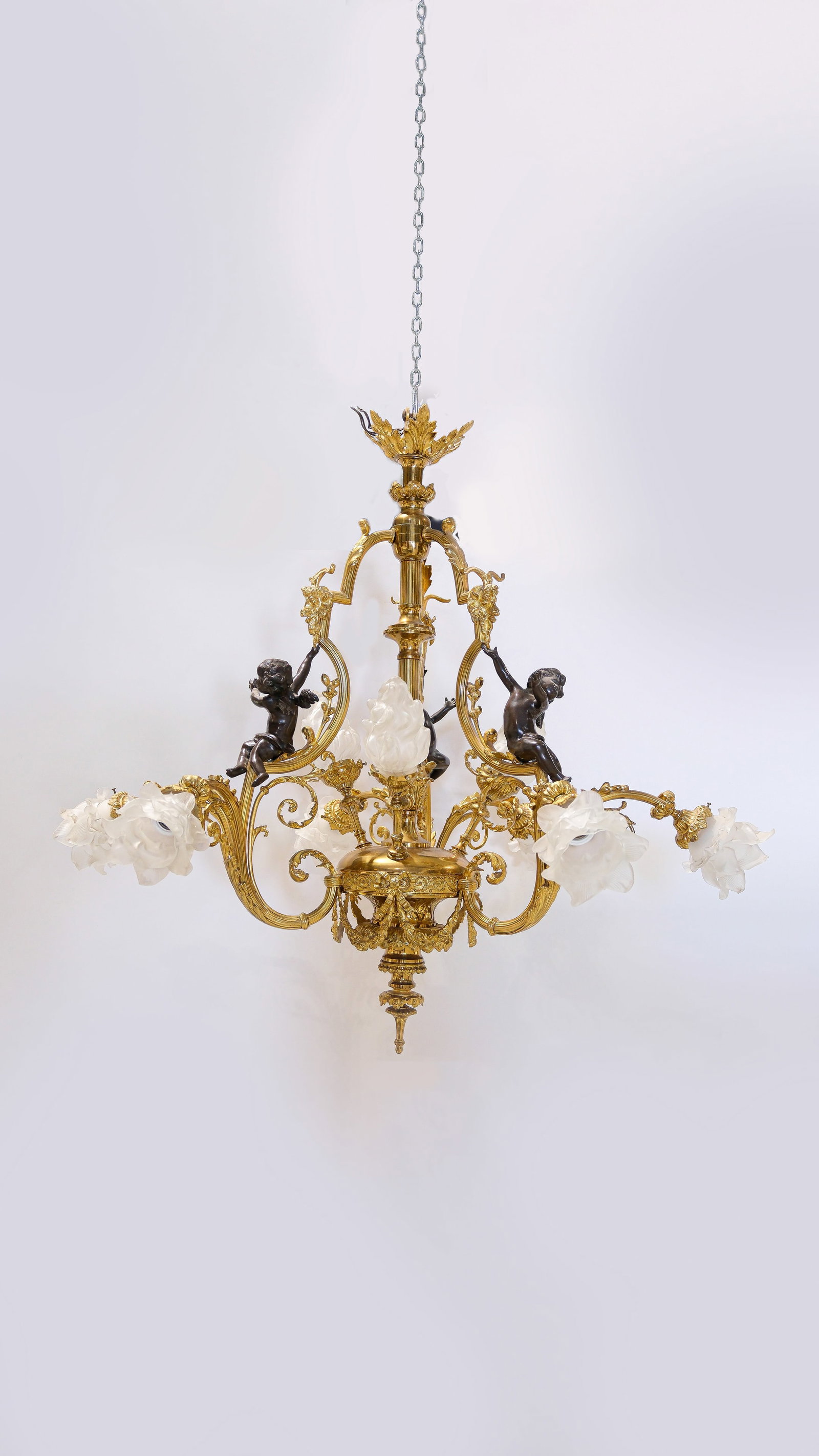 A French Antique gilt bronze lighting chandelier, with patinated figural putti's. 19th Century (1 of 6)