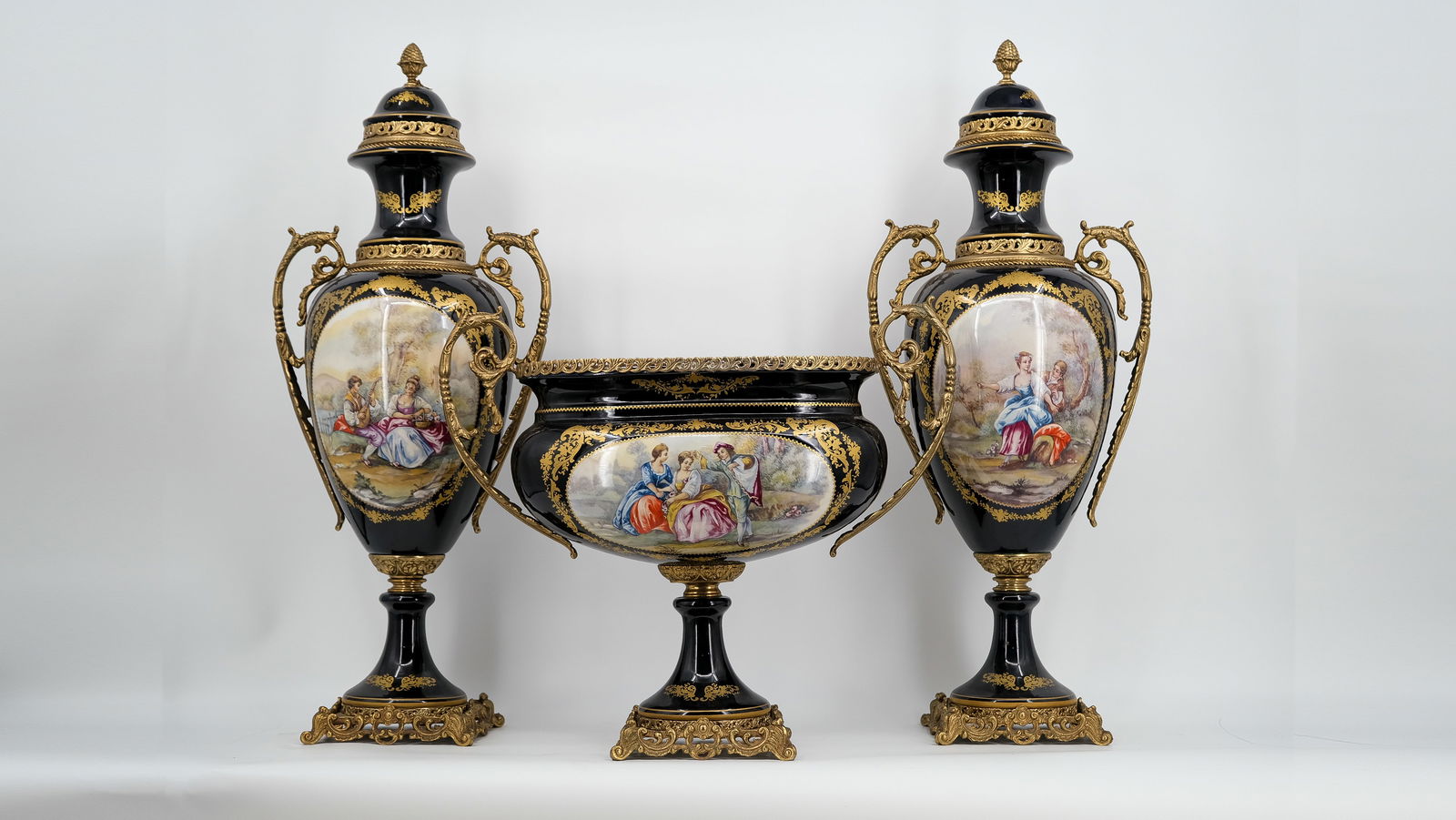 A Sevres style three piece mantle set vases by A.C.F. in glazed porcelain and gilt brass frames (1 of 6)