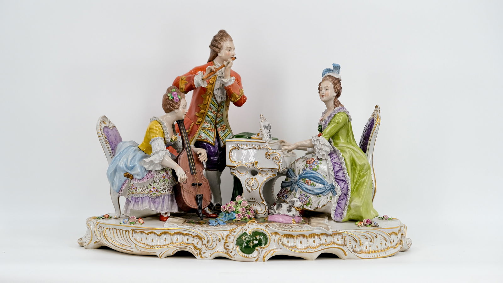 A large German Sitzendorf figural Rococo style glazed porcelain "Musical" group of two ladies and (1 of 11)