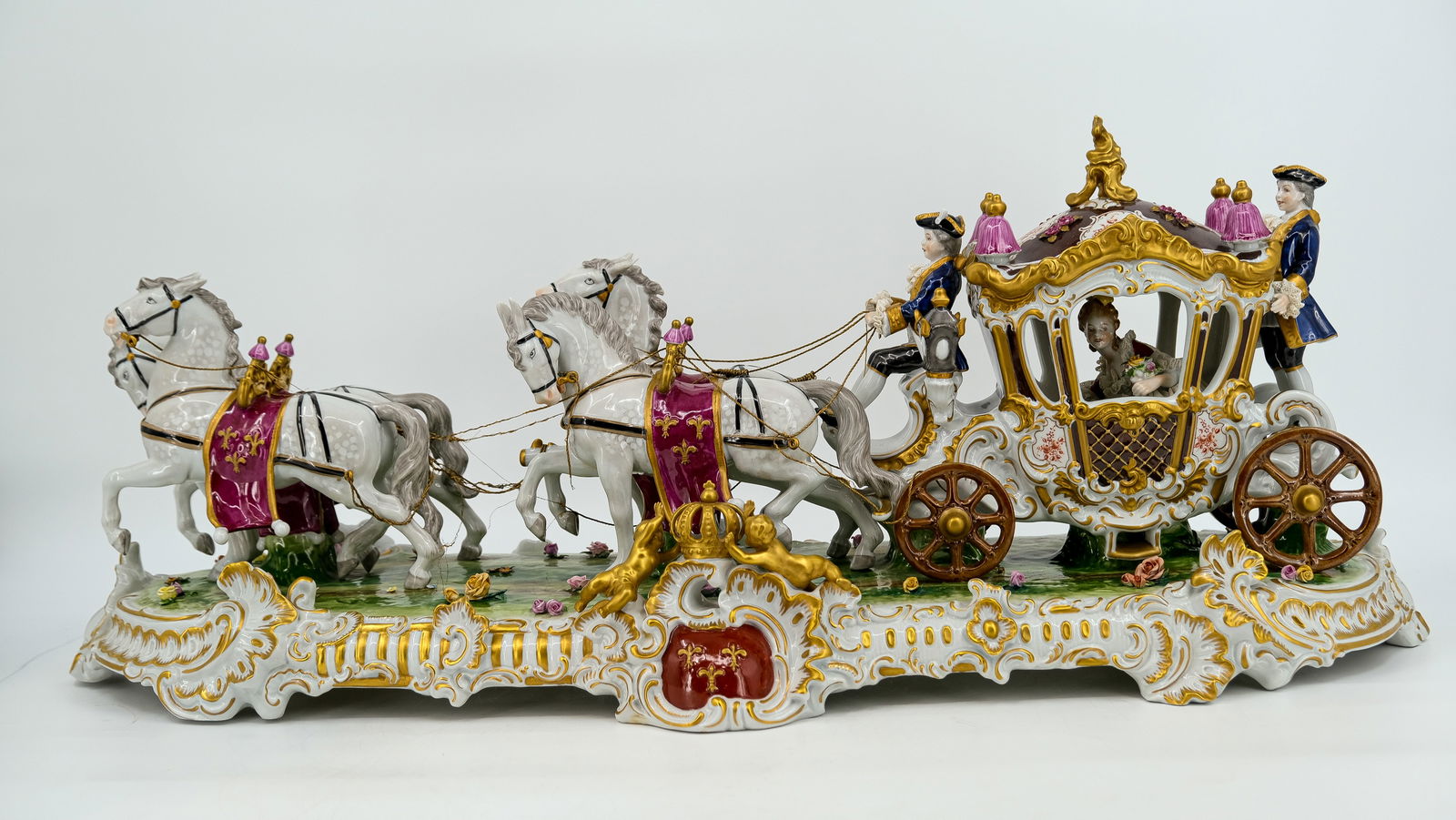 A large German Saxony Rococo style glazed porcelain figural group of carriage pulled by four horses. (1 of 13)