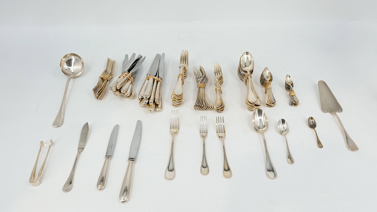 A French silver plated CHRISTOFLE "Perles" cutlery set of 111 pieces (1 of 12)