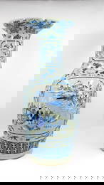 An imposing Chinese blue and white on celadon fond figural decorated porcelain vase