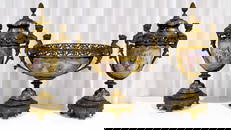 An imposing French Sevres-style three-piece gilt bronze and porcelain mantle set, signed Poitevin