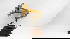 An antique PARLAPHONE gramophone with lyre-shaped brass horn