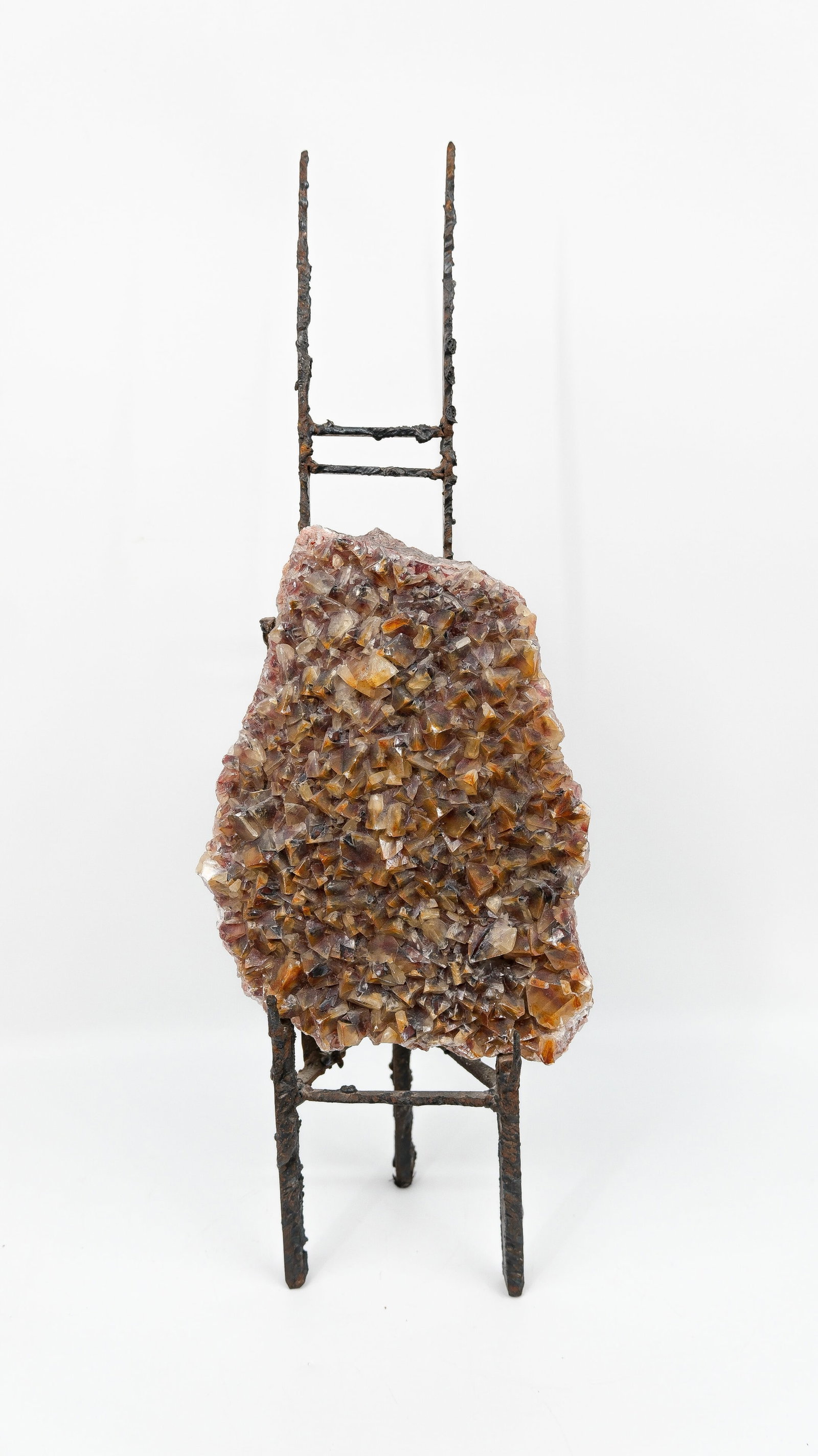 Pia MANU (XX) A vintage brutalist sculpture of a natural stone with patinated iron base: Pia MANU (XX). A vintage brutalist sculpture of a natural stone with patinated iron base. Circa 1970–1980s. H: 60 cm