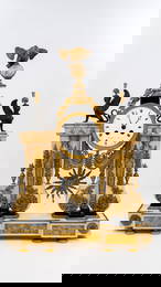 An imposing Empire style gilt and patinated bronze white marble mantle clock by Thiaffait à Lyon