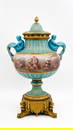 An imposing and antique gilt bronze mounted and Sèvres style finely decorated centerpiece