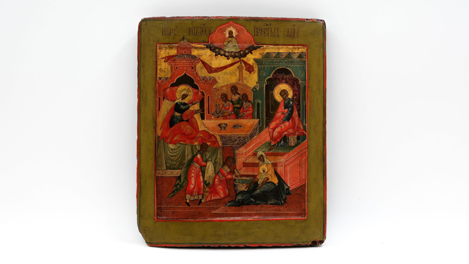 An antique Russian tempera on wood icon with depicting the Nativity of the Mother of God (1 of 5)