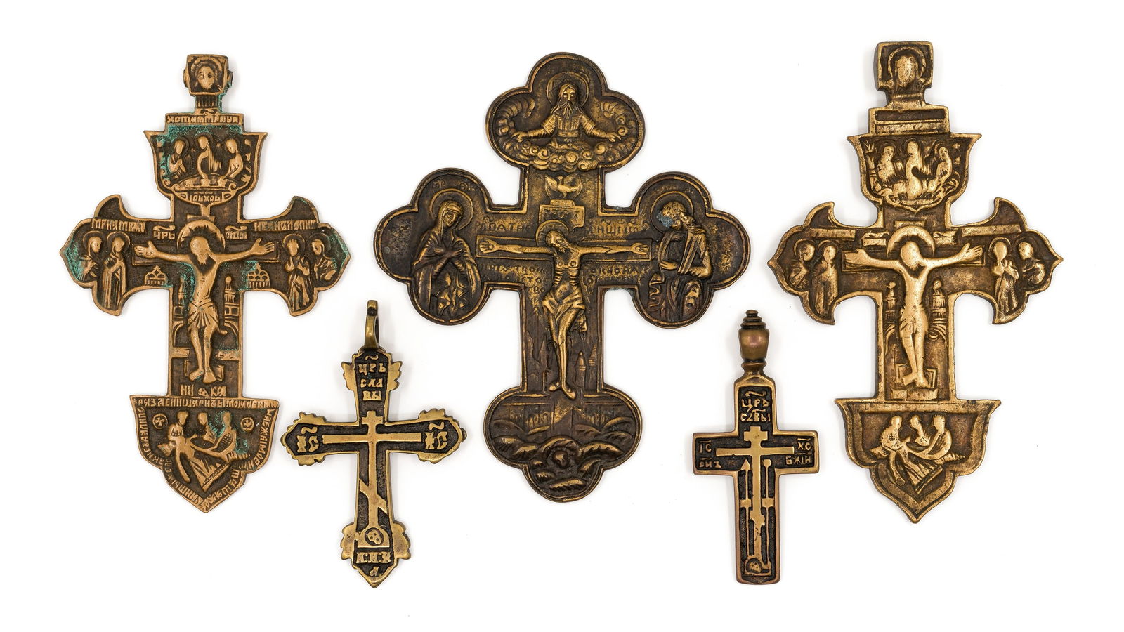 An antique Russian set of five cast bronze Orthodox crosses with relief decoration (1 of 11)