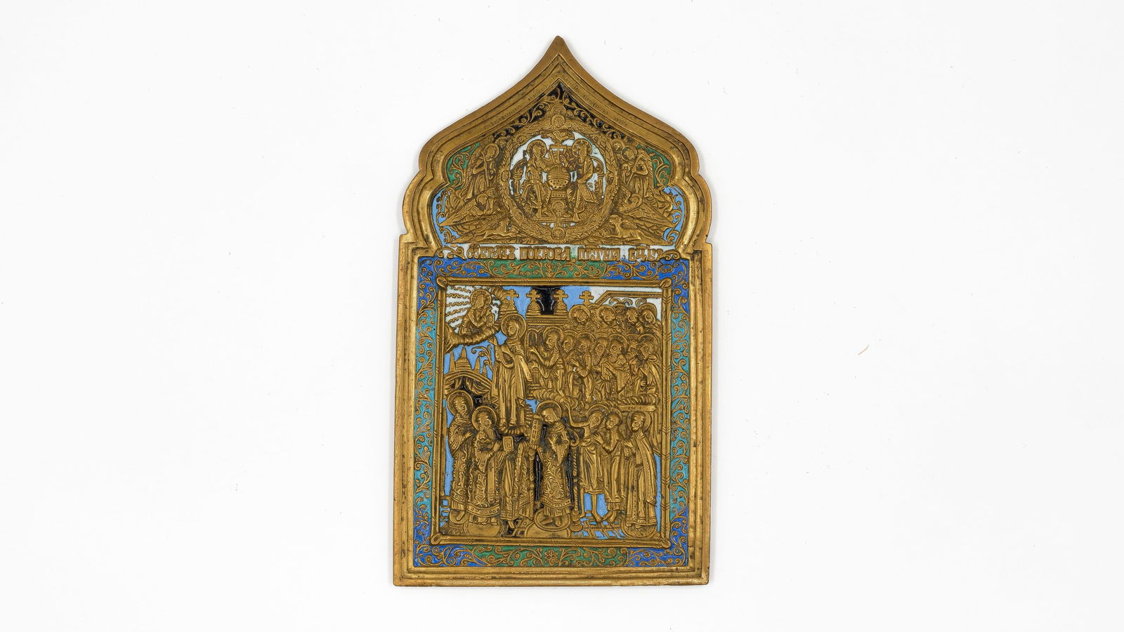 An antique Russian gilt bronze and enamel icon plaque depicting the Protection of the Mother of God (1 of 4)