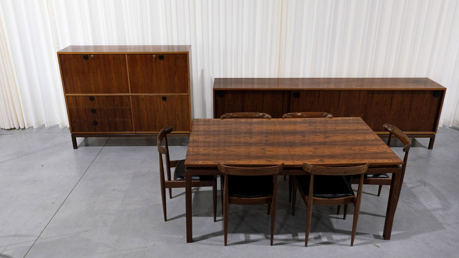 A Belgian vintage dining room set by Alfred HENDRICKX for Belform: A Belgian vintage dining room set by Alfred HENDRICKX for Belform. Consisting of: -One sideboard with three sliding doors. -One high cabinet with three drawers and four doors. -One extendable table w