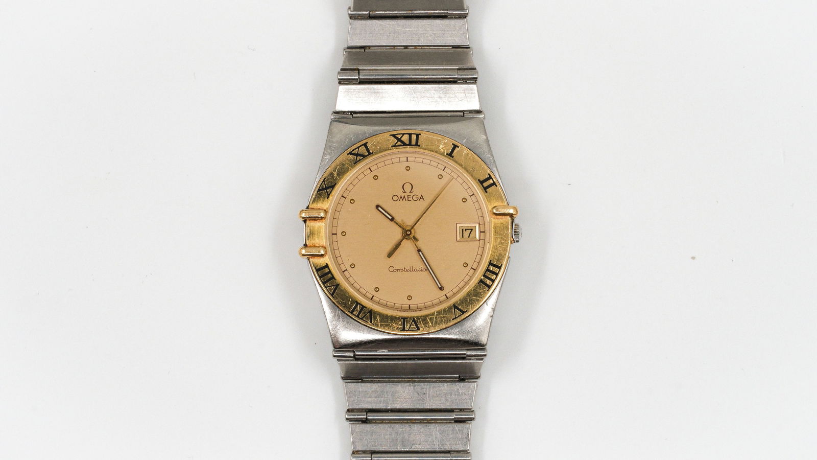 An Omega Constellation men's wristwatch, steel and 18k yellow gold (1 of 5)
