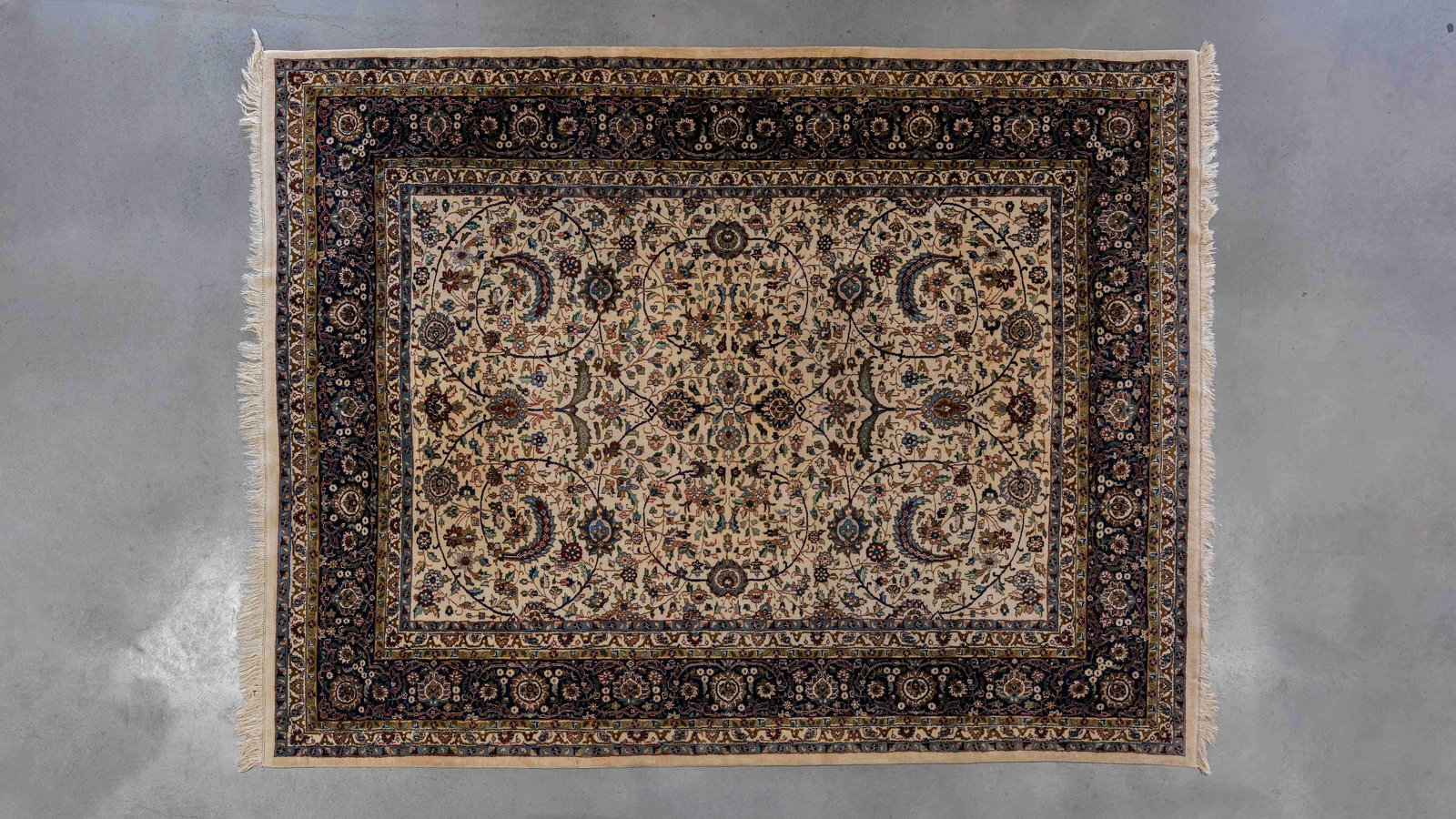 A large hand-knotted Isfahan Oriental decorated wool carpet (1 of 7)