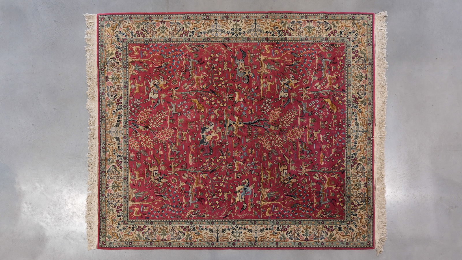 A large Oriental Persian hand-knotted animal-decorated wool carpet (1 of 12)