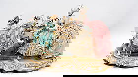 A large Italian Capodimonte figural porcelain group of a lady and child at the piano lesson: A large Italian Capodimonte figural porcelain group of a lady and child at the piano lesson. Marked and 20th century. H: 34 - W: 55 cm