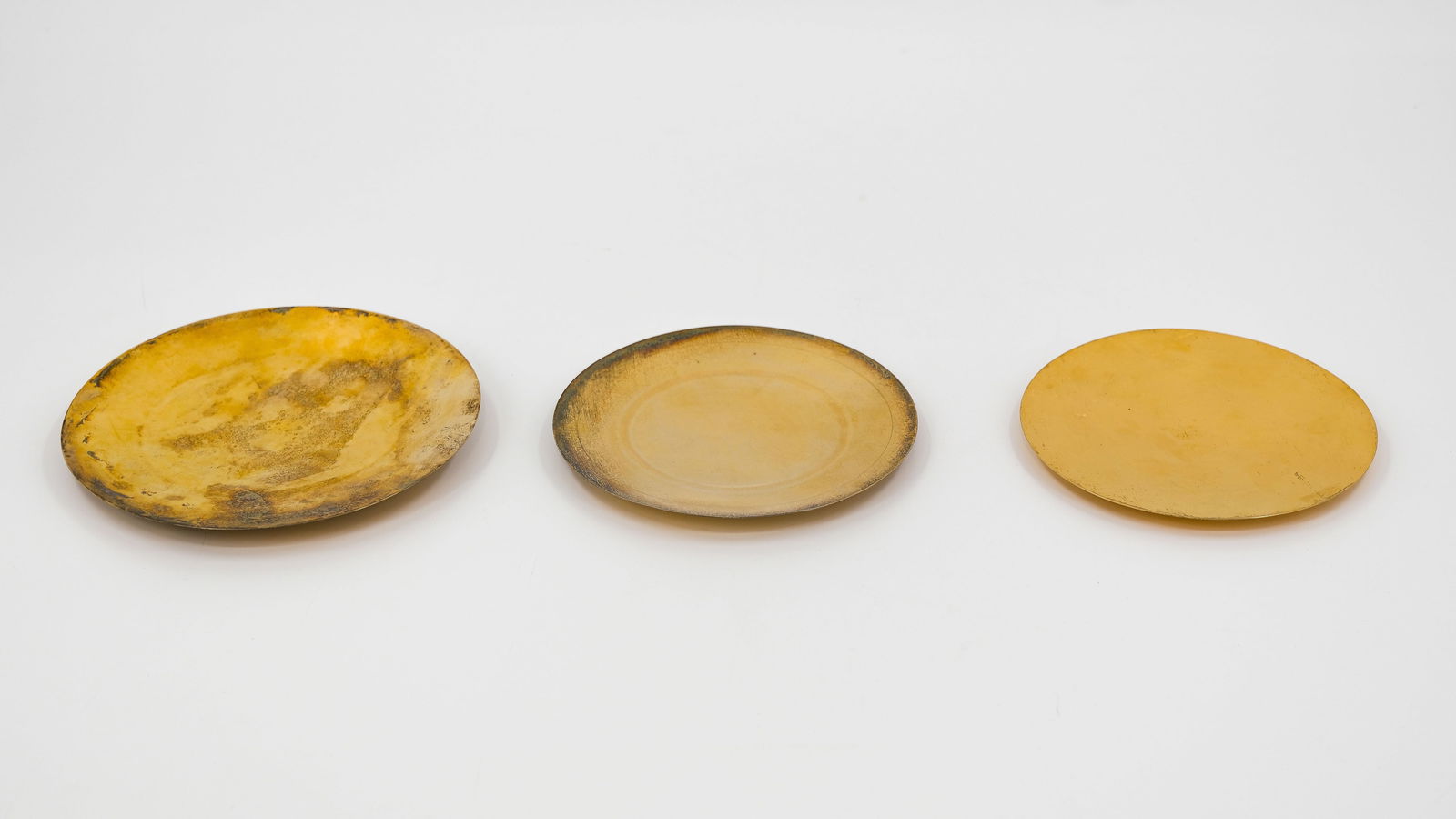 A religious lot of three gilt silver pateen (1 of 7)