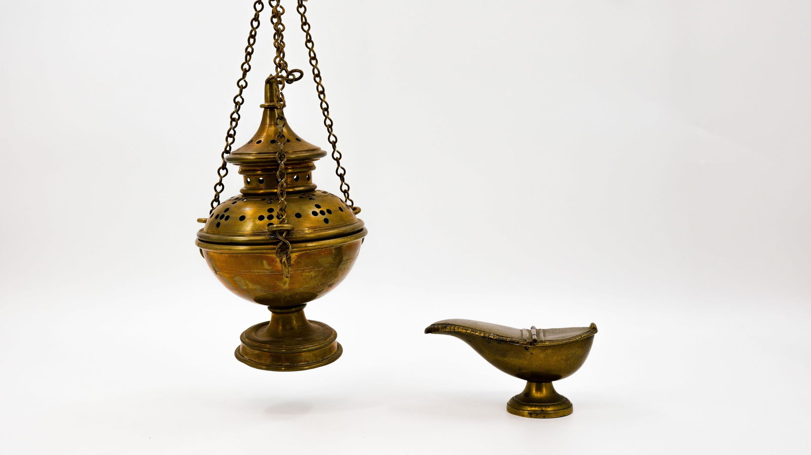 A religious polished brass church censer on chain together with a brass boat censer (1 of 14)