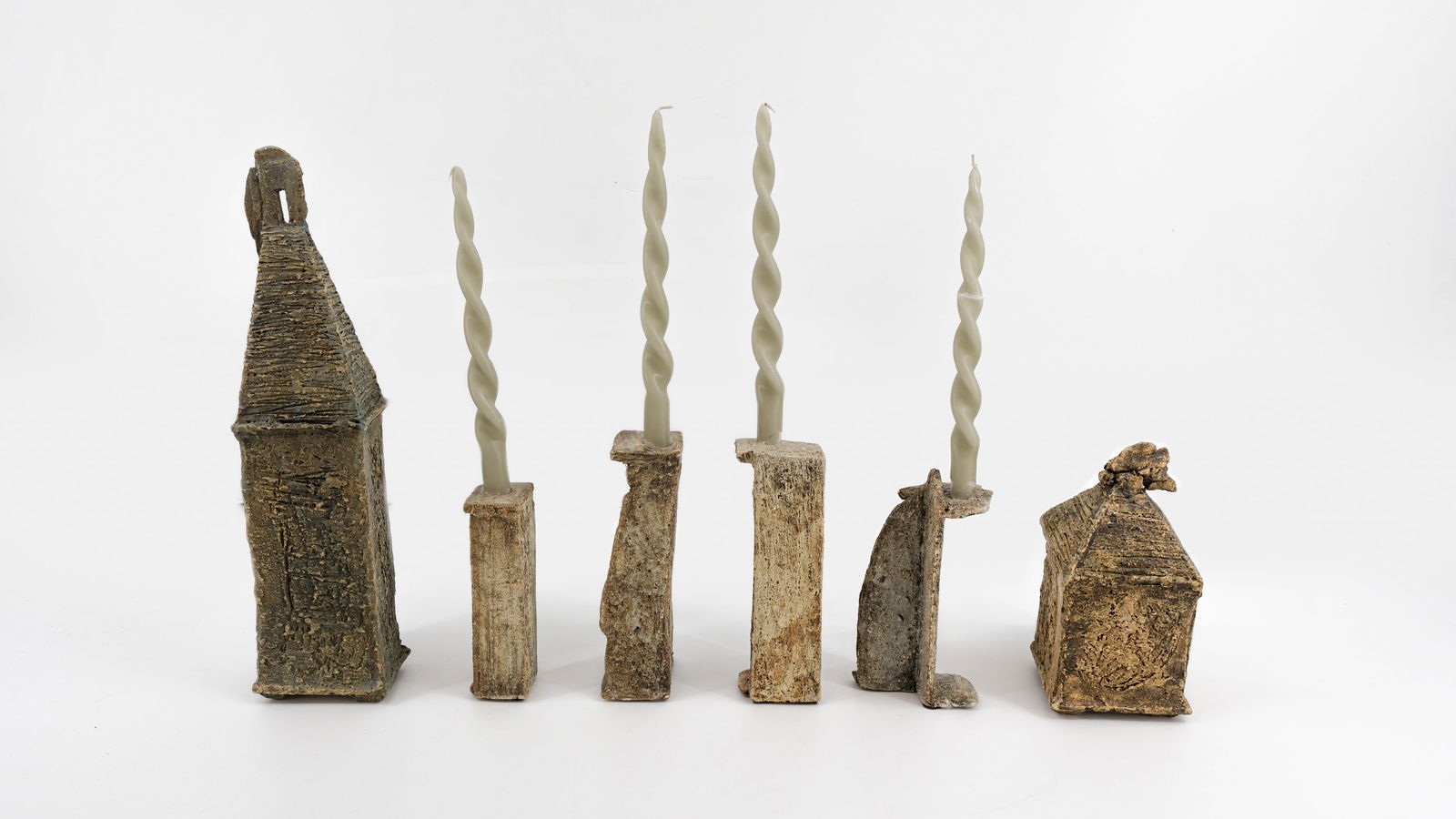 Pia MANU (XX). Attributed to. A lot of six various patinated ceramic candleholder objects: Pia MANU (XX) attributed to. A lot of six various patinated ceramic candleholder objects. Circa 1980s. H: 19 - 48 cm