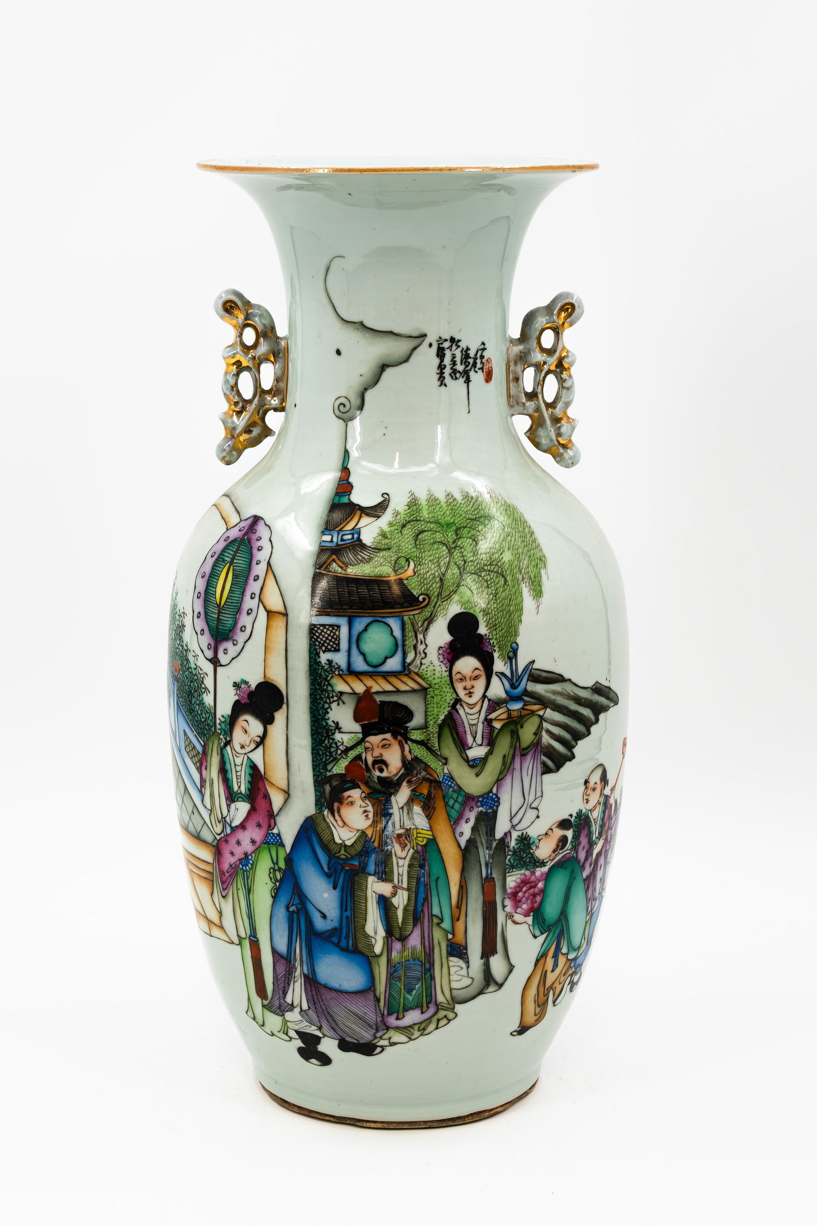 A Chinese Qianjiang and Famille Rose decorated porcelain vase with an animated garden scene (1 of 13)