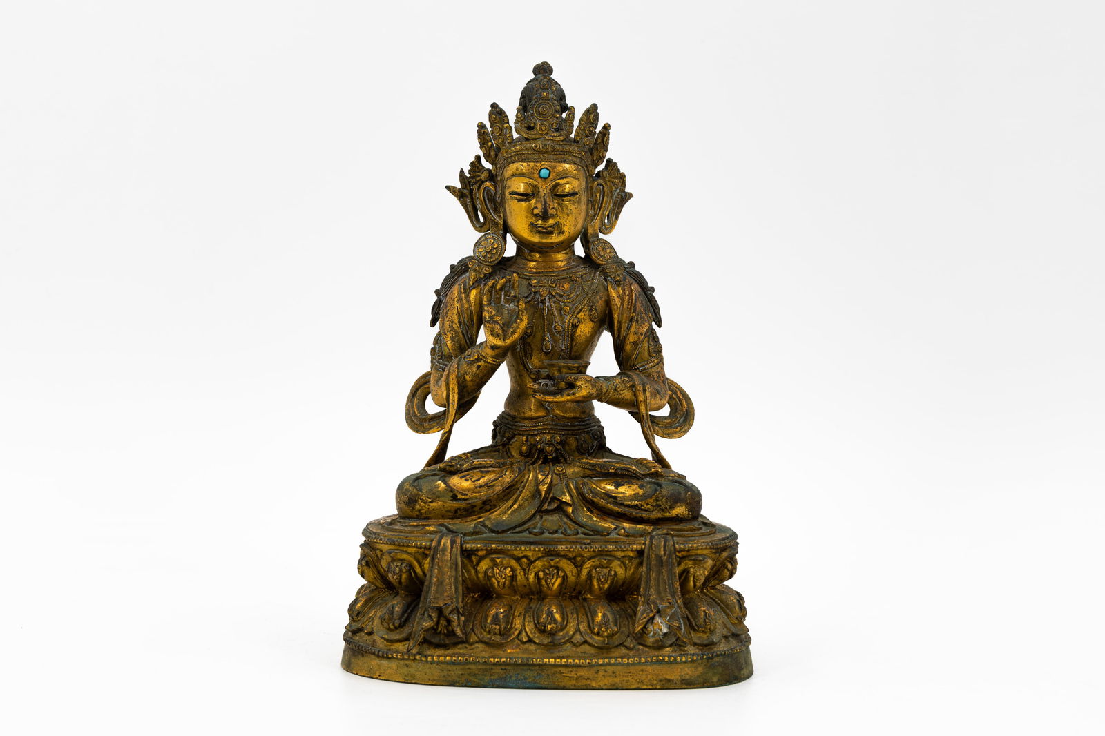 An antique Tibetan gilt bronze figure of seated Buddha Vajrasattva (1 of 14)
