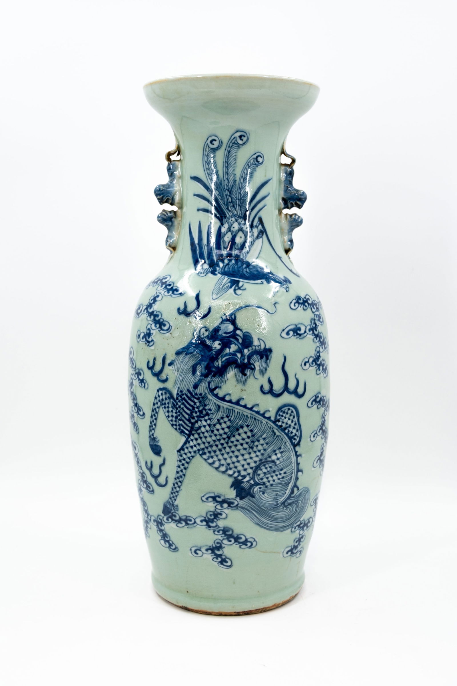 A Chinese blue and white decorated porcelain vase, decorated with a dragon and phoenix in the clouds (1 of 11)