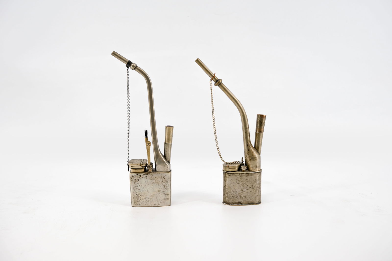 A lot of two Chinese Paktong engraved brass opium pipes (1 of 14)