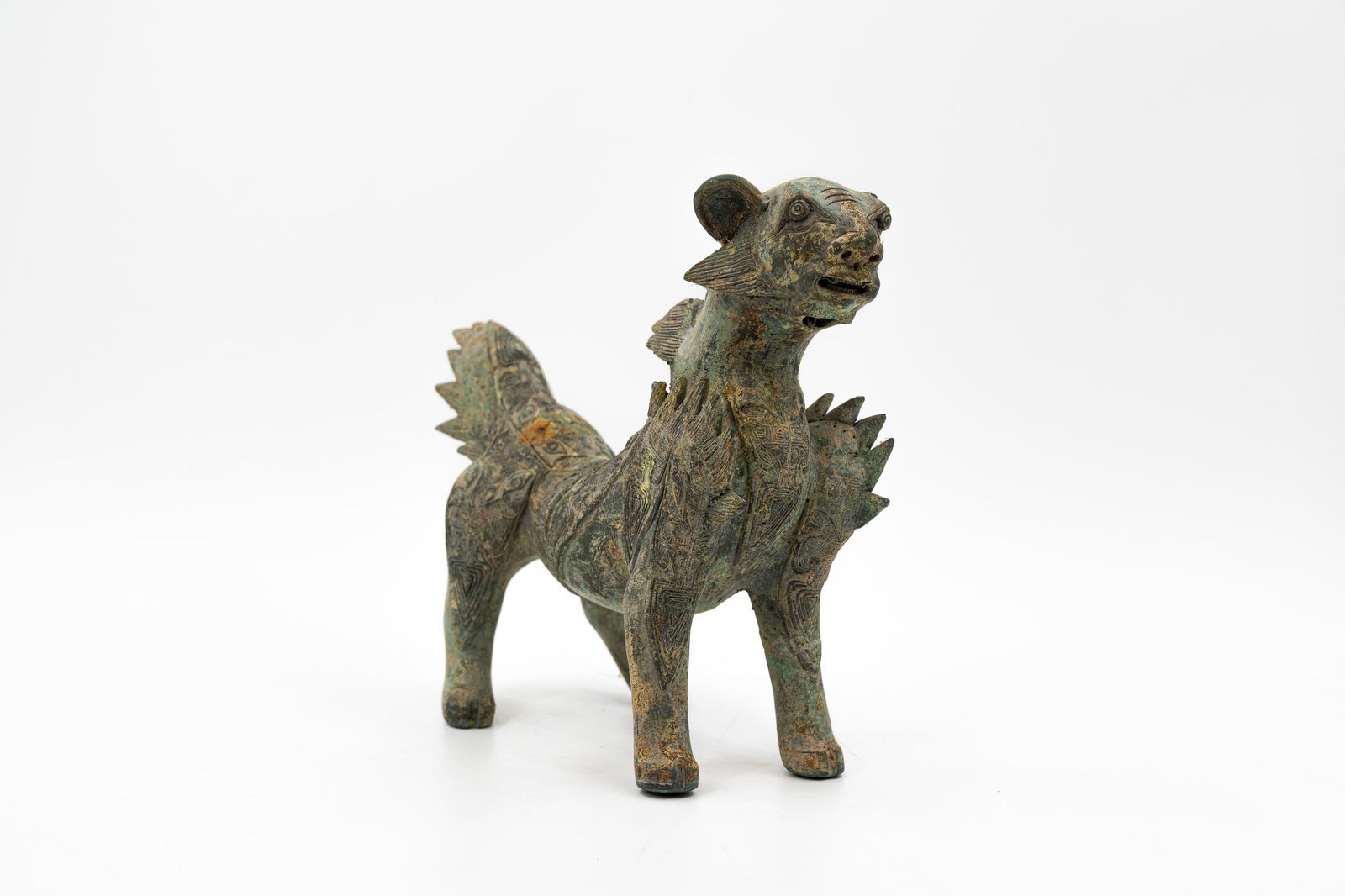 A rare and antique Chinese bronze figure of a mythical animal (1 of 18)