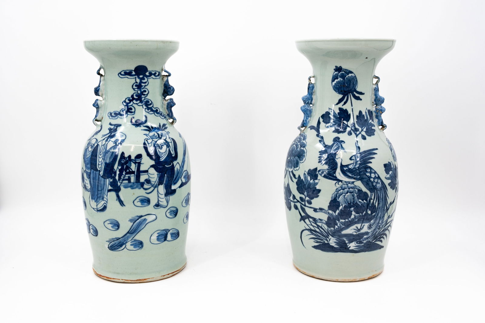 A lot of two Chinese blue on white figural and phoenix decorated porcelain vases (1 of 15)