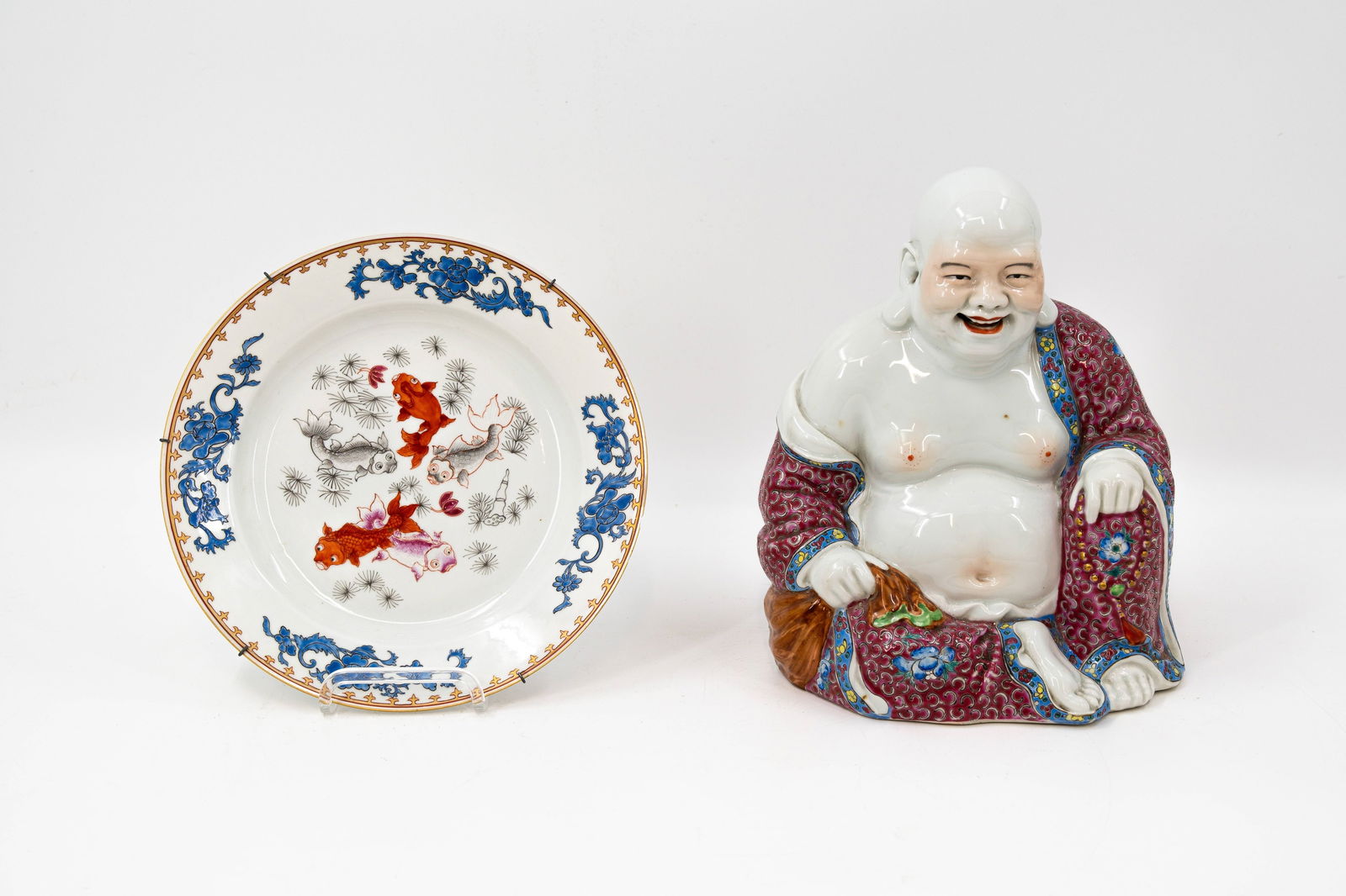 A 20th century Chinese porcelain Buddha and an antique porcelain plate decorated with fish (1 of 13)