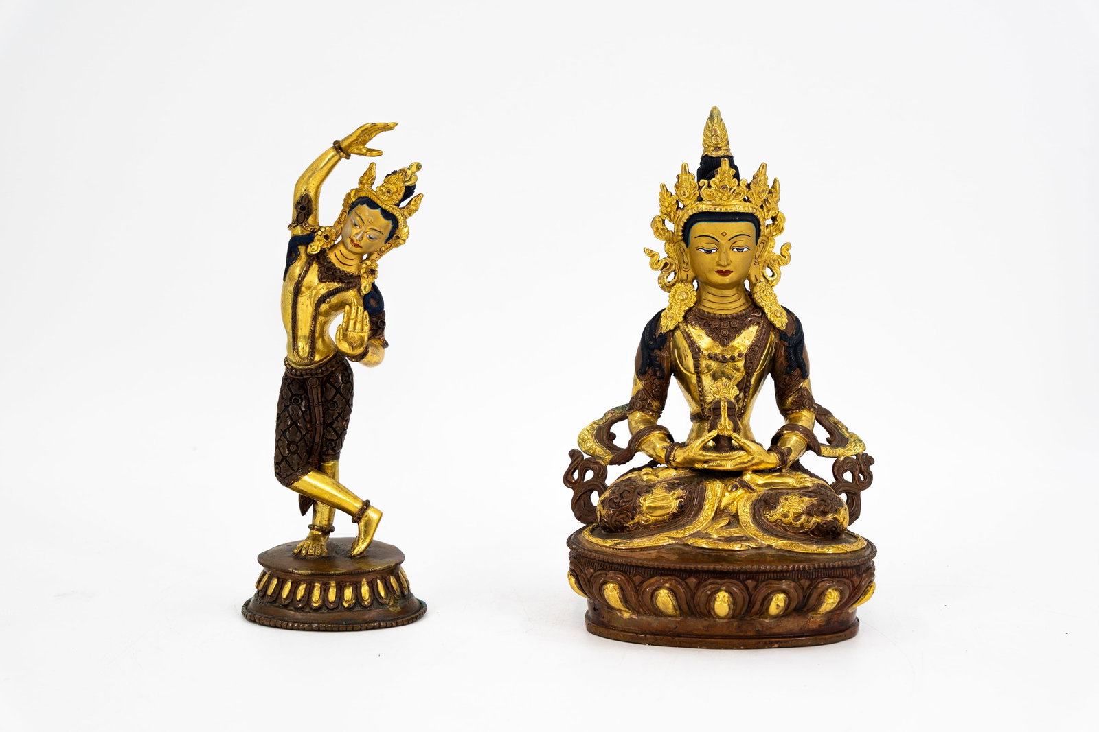 A lot of two Tibetan gilt bronze buddha sculptures depicting Maya Devi and Amitayus (1 of 15)