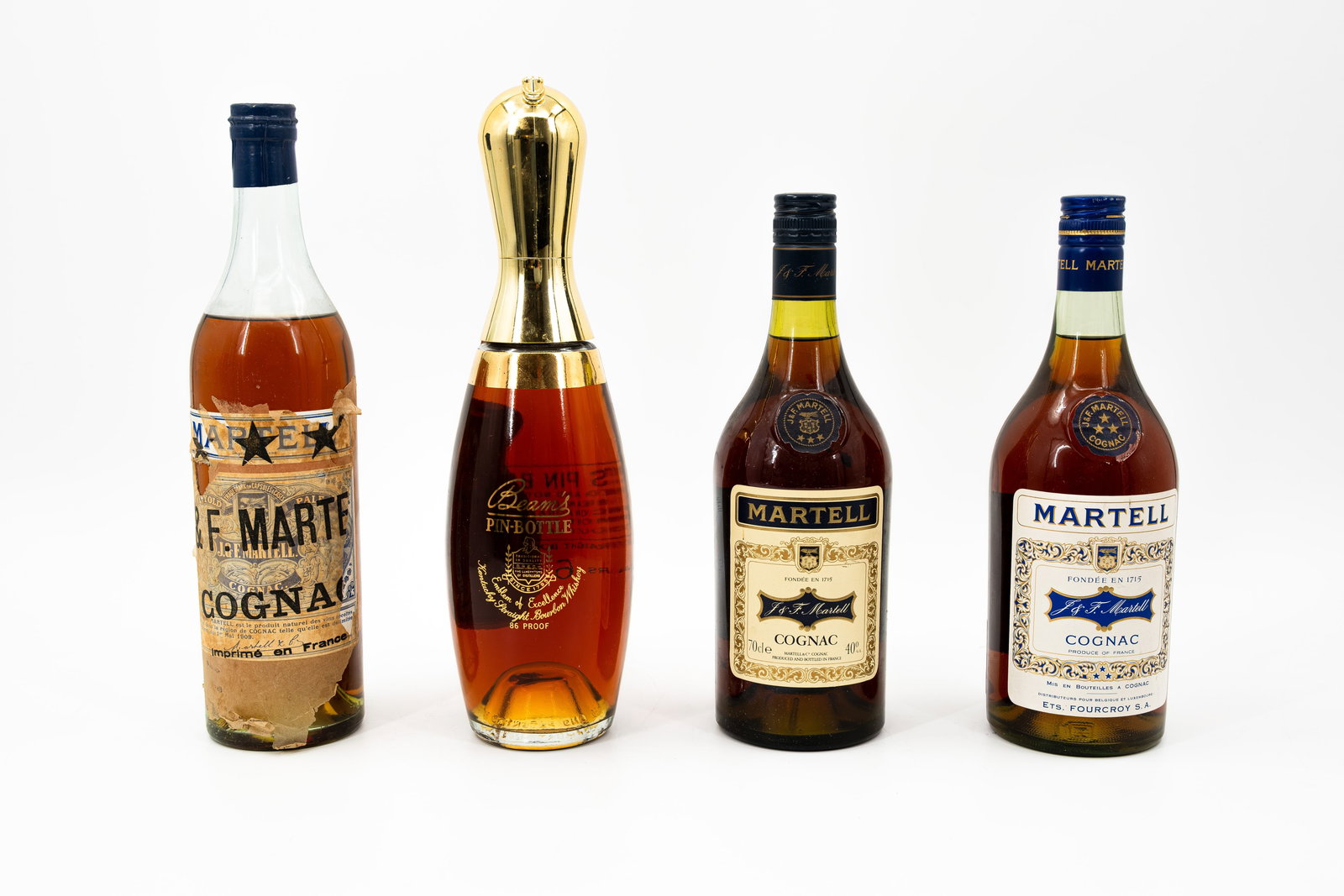 A lot of four various bottles of spirits an liquors (1 of 20)