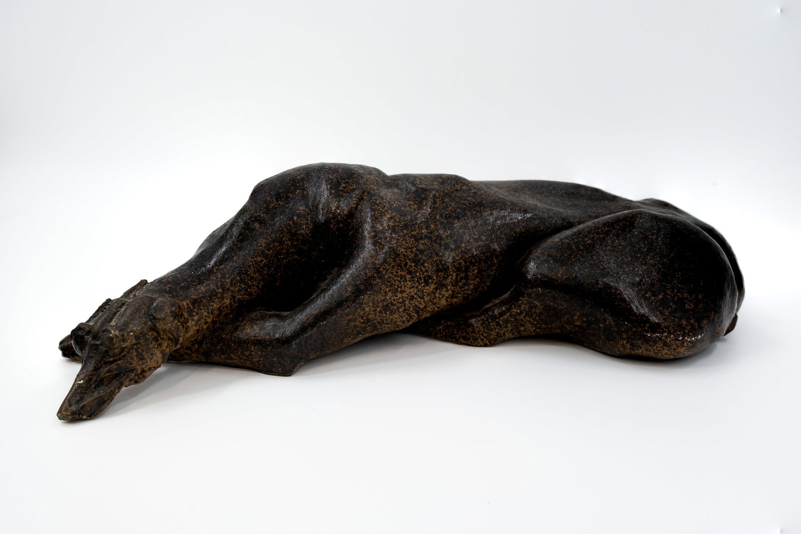 A heavy 20th century modern art cast bronze sculpture of a lying resting greyhound (1 of 8)