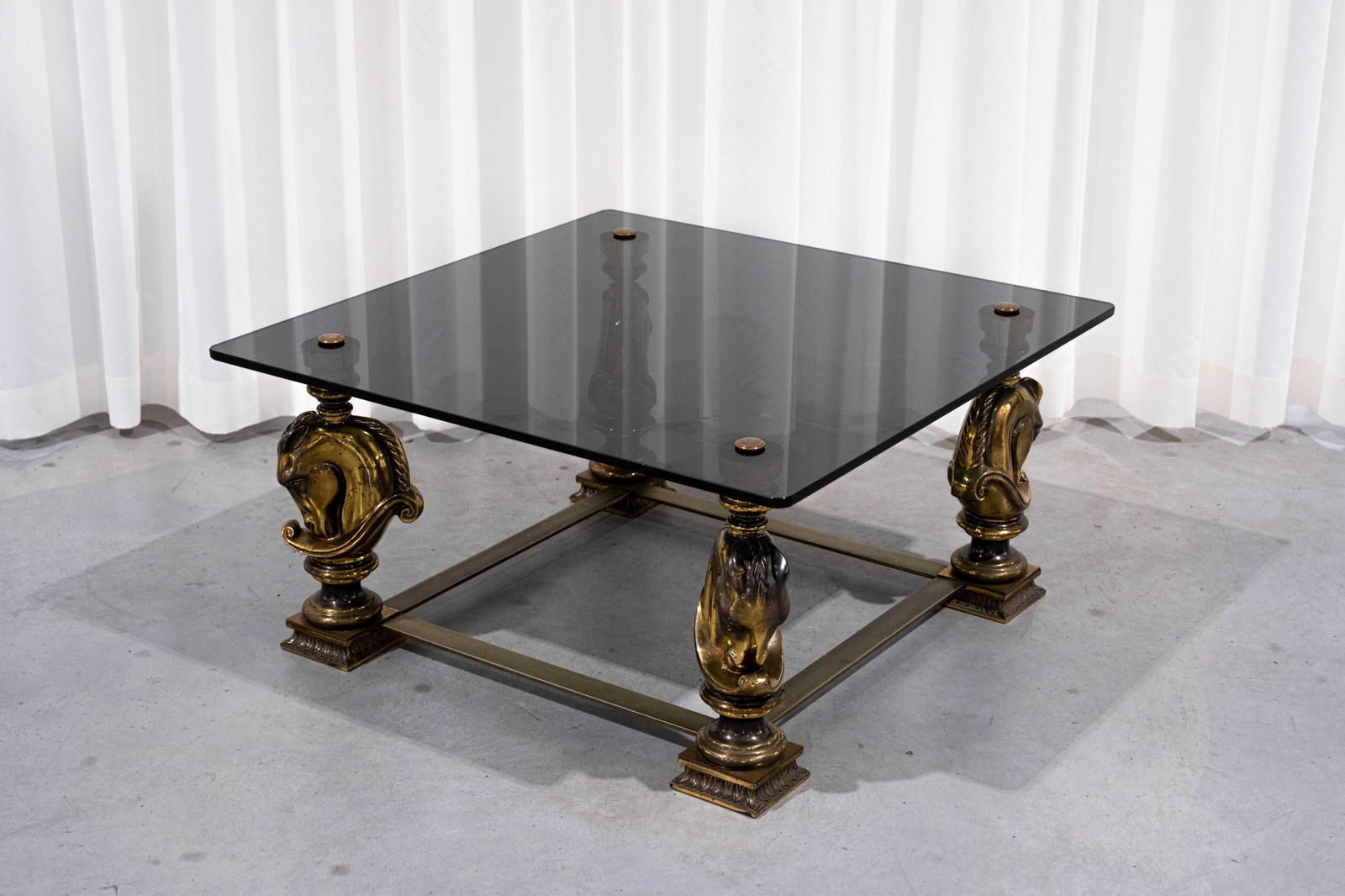 A vintage brass and fumed glass square coffee table with horse shaped figures (1 of 4)