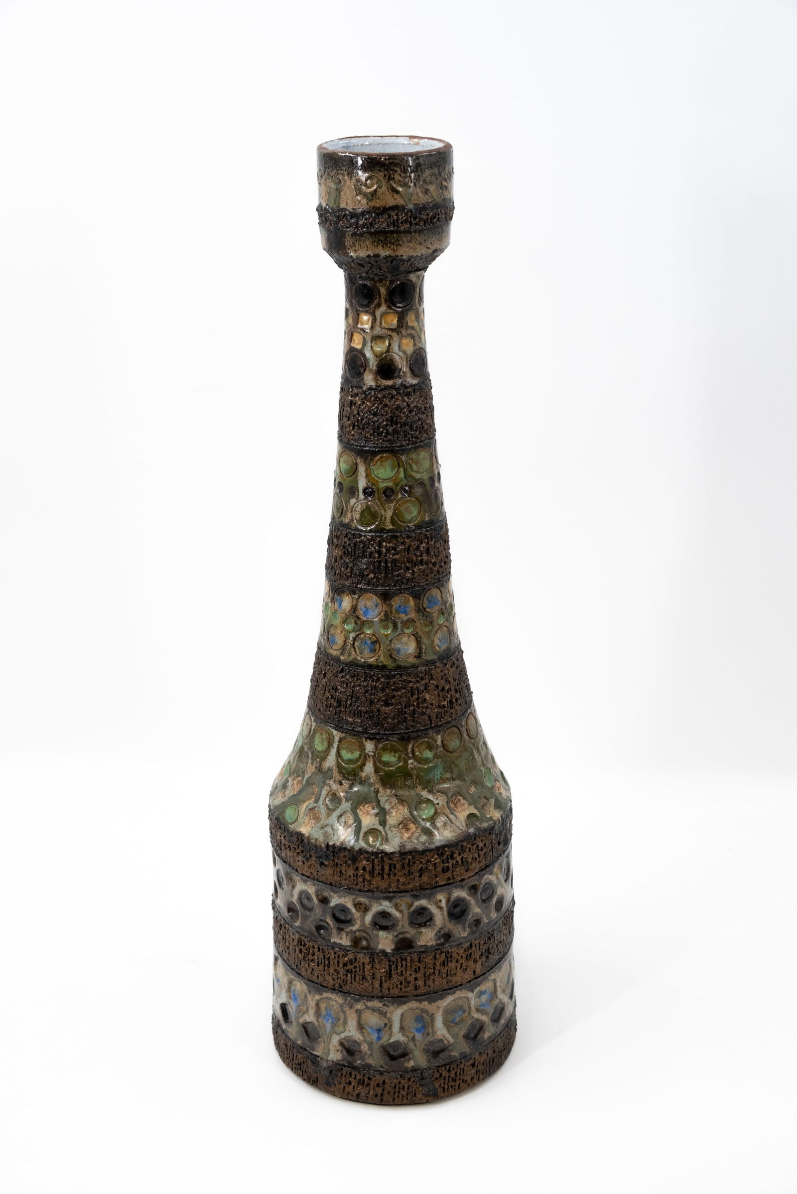 A vintage bottle shaped relief vase in glazed ceramic (1 of 9)